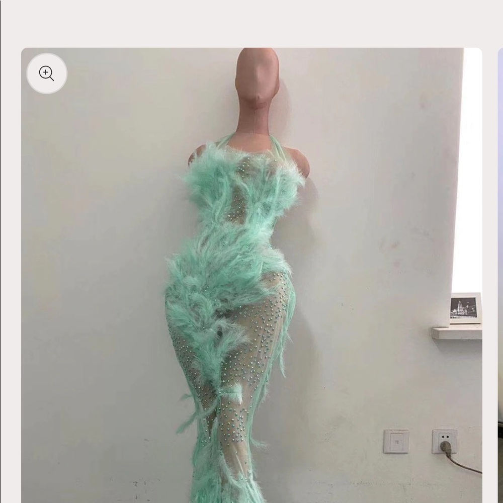 Custom made turquoise mess with feathers and crystals.